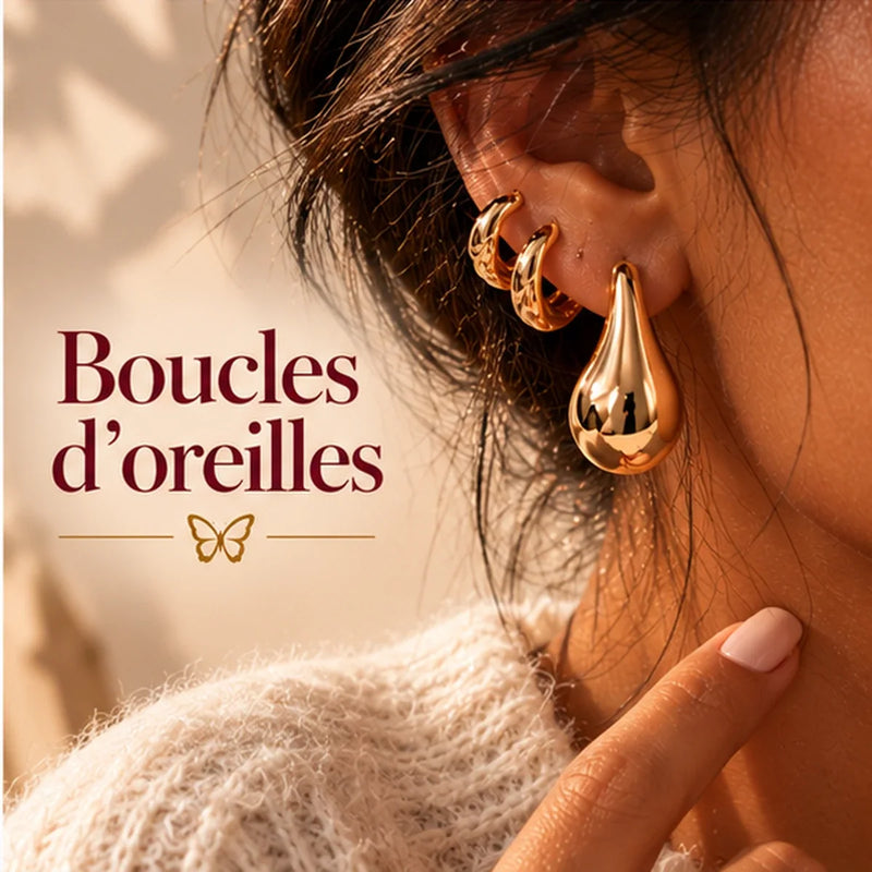 Boucles d’oreilles dorées sur peau mate, look écru — Swiss Beautyfly