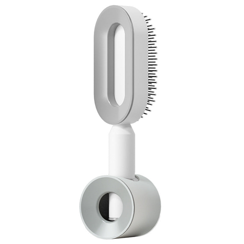 Brosse autonettoyante D’un Geste blanche, modèle à poussoir